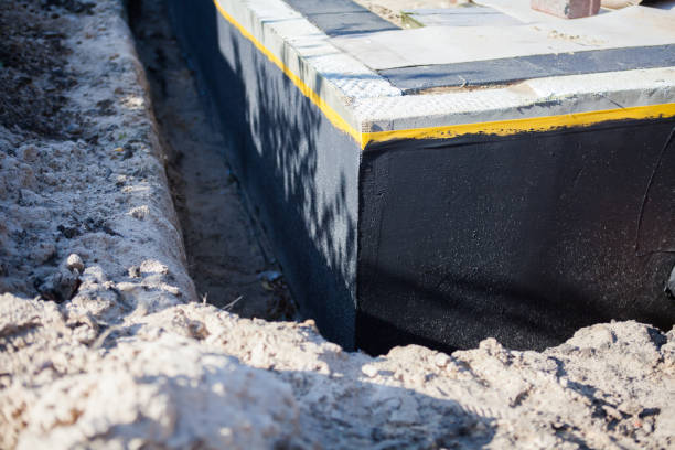Professional Emergency Waterproofing technician working in Henderson, TN